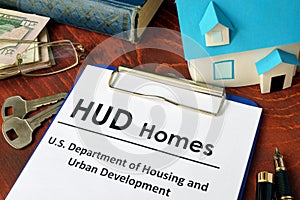 Paper with words HUD homes