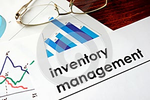 Paper with words inventory management. photo