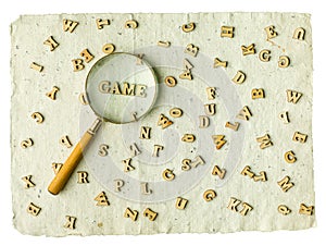 Search Game magnifier word and letters on a vintage paper