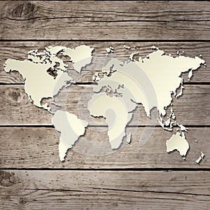 Paper world map on a wooden board vector