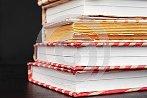 Paperback books on a table. creative photo.