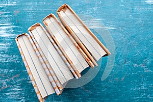 Paperback books on a table. creative photo.