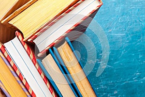 Paperback books on a table. creative photo.