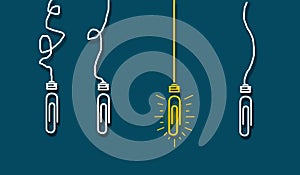 Paperclip Stand out concept, Standing out glowing light bulb or coupler from others. Light bulb glows, Creative ideas business