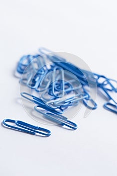 Paperclips on a white surface