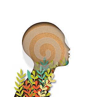 Papercut woman head with colorful paper leaves