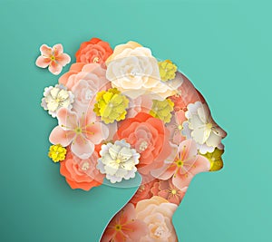 Papercut woman head with spring flowers