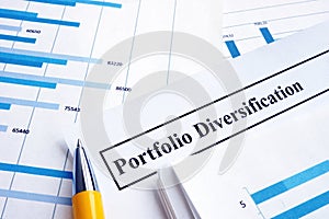 Papers about investment portfolio diversification. photo