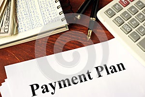 Papers with title payment plan.