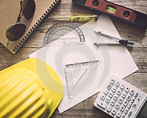 Paperwork with writing materials for architecture on table