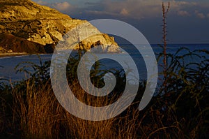 Paphos. Cyprus. Petra Tou Romiu. Sunset at the rocks of Aphrodite photo