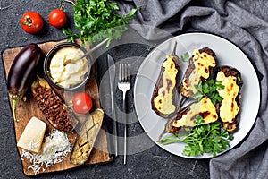 Papoutsakia stuffed eggplants, top view, flat lay