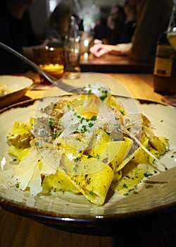 Pappardelle ai Funghi plating with a Poached Egg