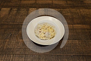 Pappardelle is a kind of wide fettuccine. The name derives from the photo