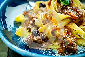 Pappardelle pasta with braised beef, Basil, Parmesan