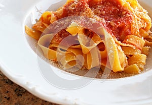 Pappardelle pasta with tomato sauce photo