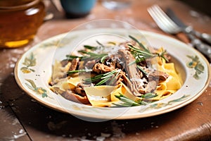 pappardelle with wild mushrooms on an earthenware plate