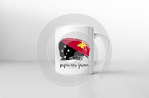 Papua New Guinea flag souvenir mug on white background. 3D rende