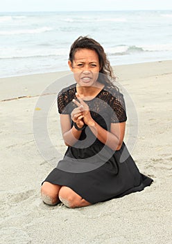 Papuan girl on beach