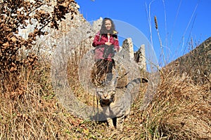 Papuan girl with cat on castle Castel Romano