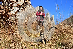 Papuan girl with cat on castle Castel Romano