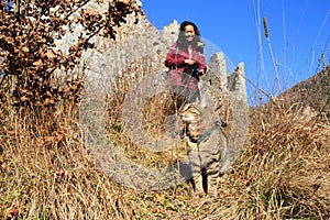 Papuan girl with cat on castle Castel Romano