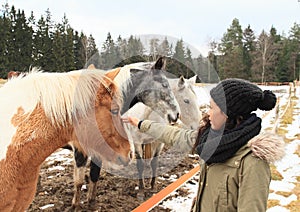 Papuan girl with horses