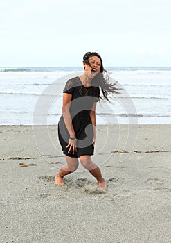 Papuan girl shouting on beach