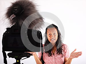 Papuan girl talking in front of camera