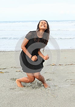 Papuan girl yelling on beach