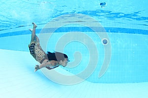 Papuan woman swimming in pool