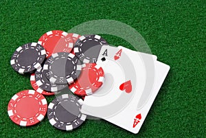 Par of aces and some poker chips photo