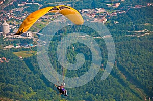Para-glider over forest photo