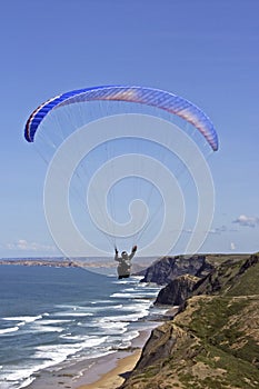 Para gliding along the coast in Portugal photo