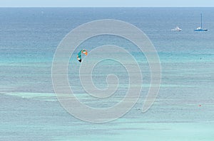 Para sailing in a blue caribbean sea