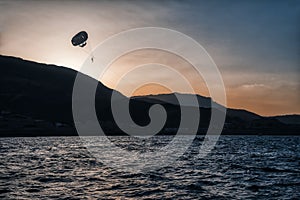 Sunset parachute para sailing photo