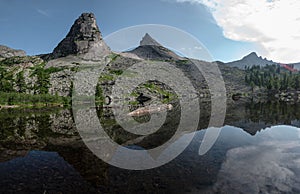 Parabola mount and reflection in the lake