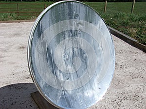 Parabolic mirror solar oven starting fire on stick