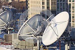 Parabolic satellite dish space technology receivers over the cit