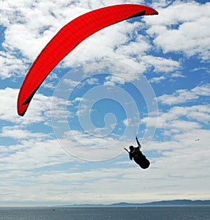 Parachute flying above the ocean