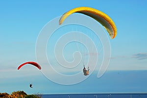 Parachute flying above the ocean