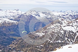 Parachute flying over a mountain chain