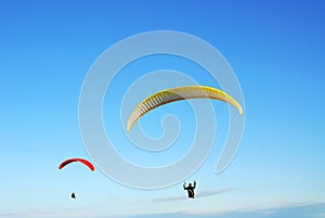 Parachute flying in sky