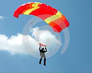 Parachuter with a yellow-red parachute