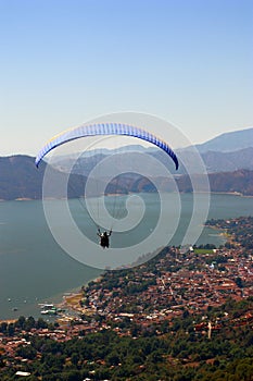 Practicing paragliding over the lake of valle de bravo, mexico I photo