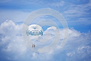 Parachuting in the sky photo