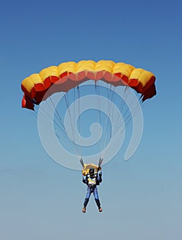 Parachutist against sky