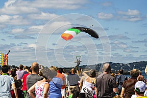 Parachutist in the blue sky