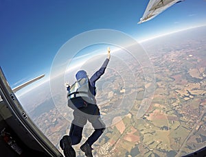 Parachutist jump from the plane. photo