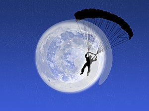 Parachutist in the moon photo